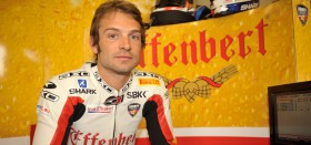 Guintoli from Sykes at a wet Assen