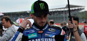 Hopkins injures hand in testing crash