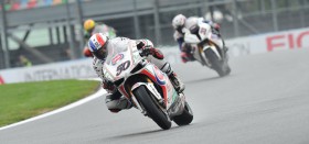 Guintoli wins as championship fight is blown wide open